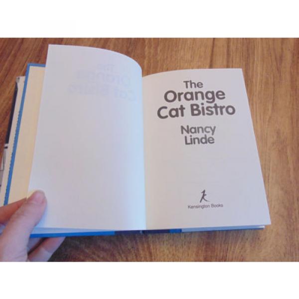 The Orange Cat Bistro - by Nancy Linde FIRST PRINTING July 1996 - HC Novel w/ DJ #5 image